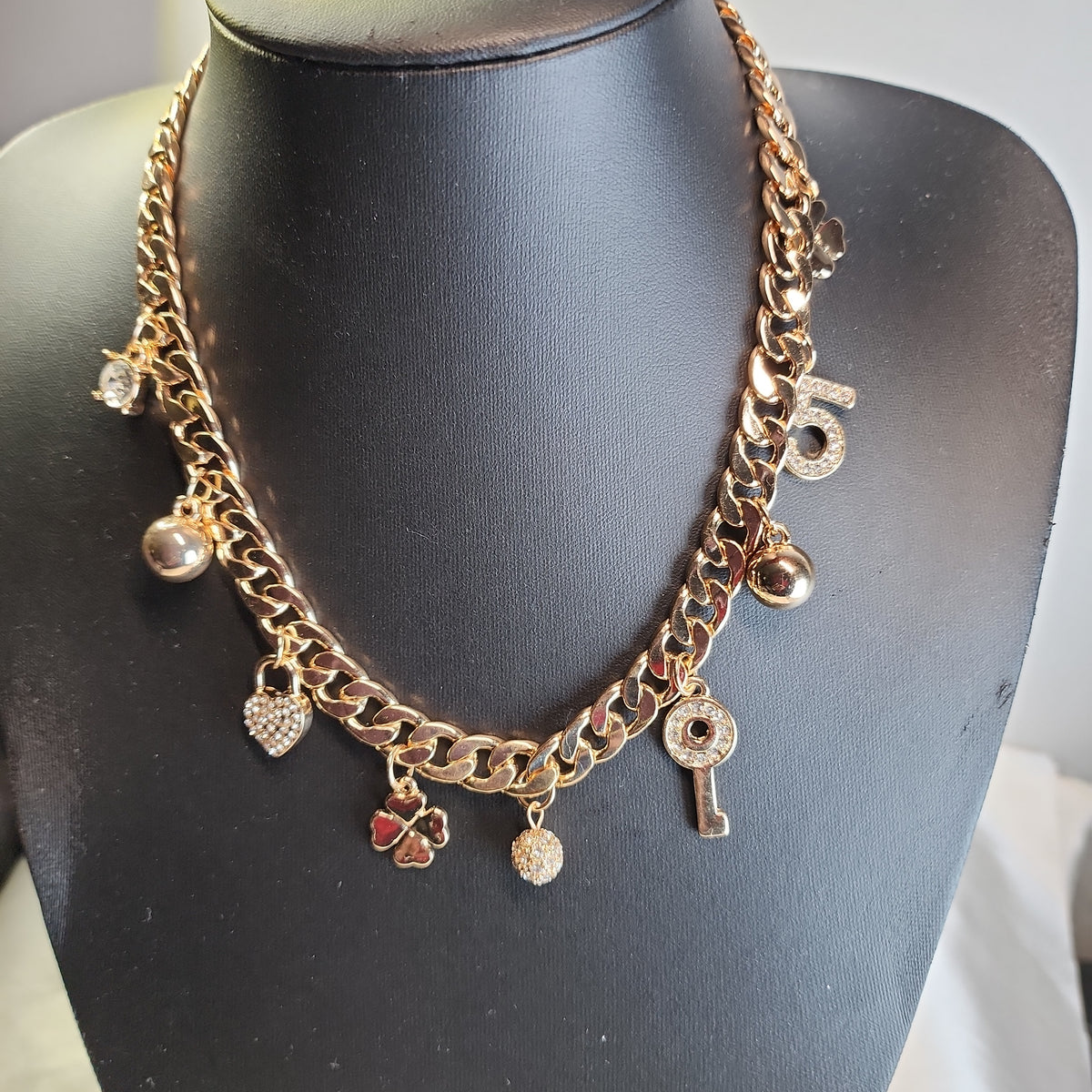 Gold charm necklace