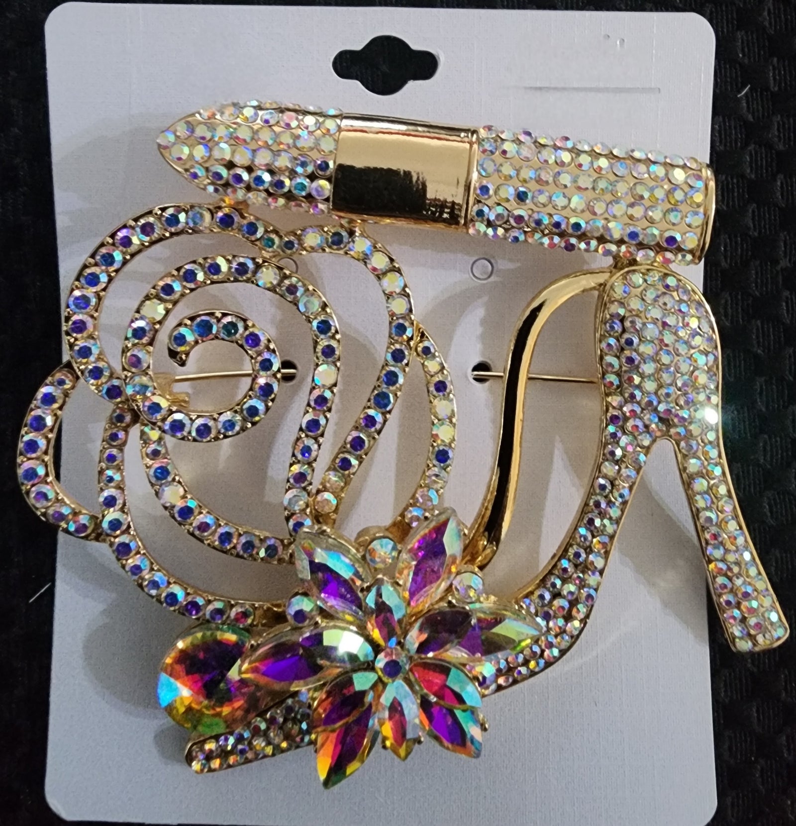 gold ab heel brooch